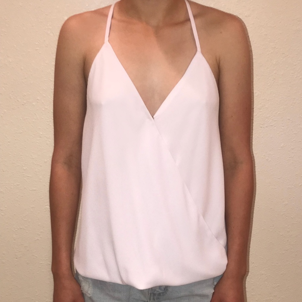 Embellished open back sleeveless top!